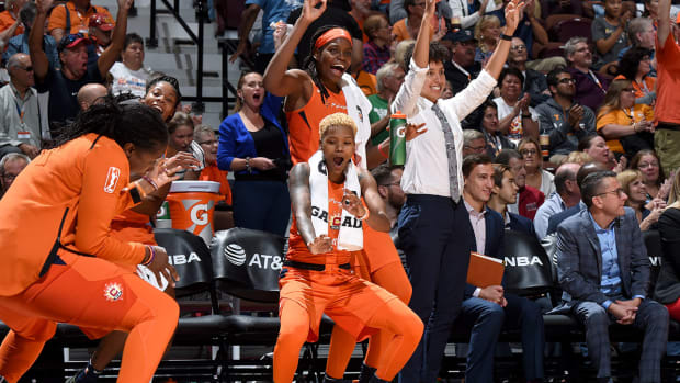courtney_williams_celebrates_as_sun_take_semis_game_2.jpg